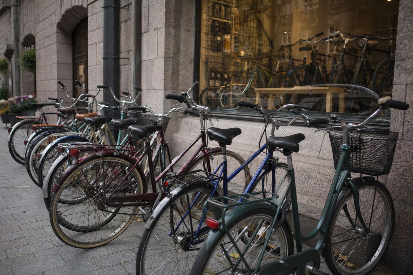 Refurbished city bikes outside the shop